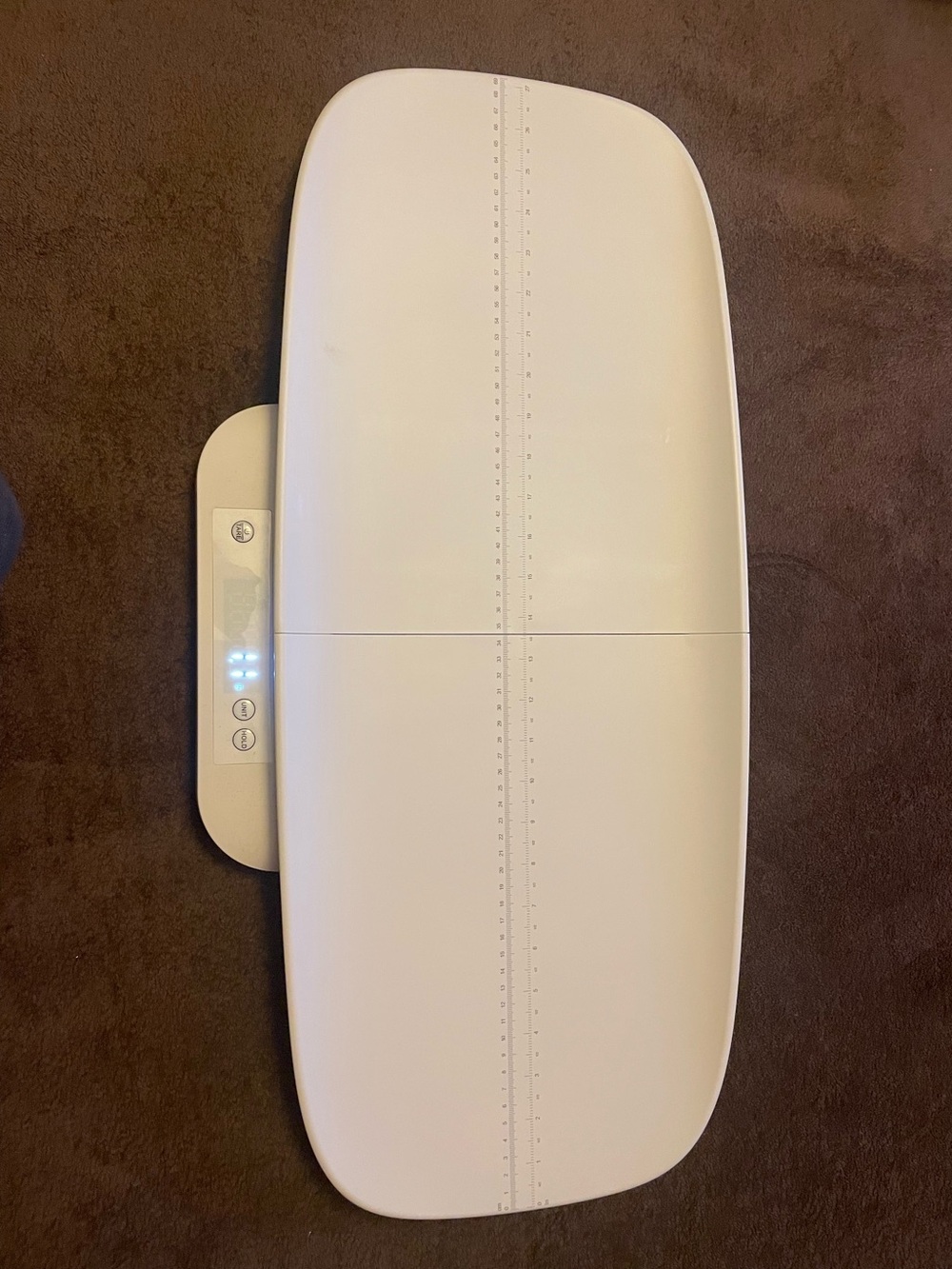 White Electronic Baby Changing Pad with LED Displaying Scale
